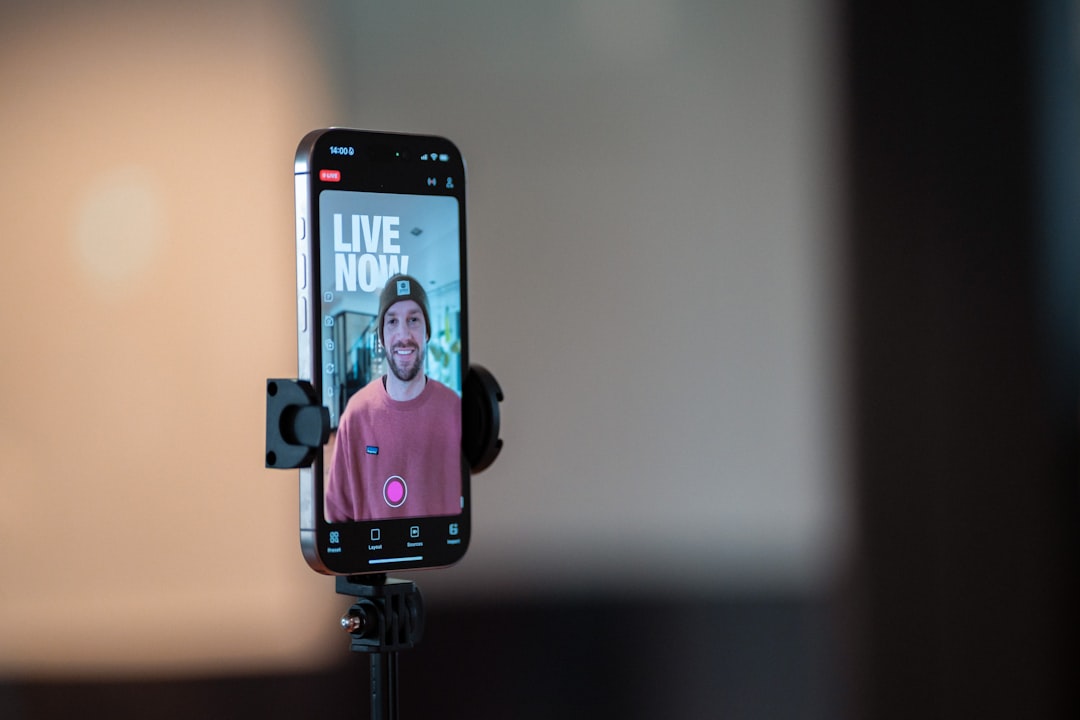 A creator broadcasting live on their smartphone